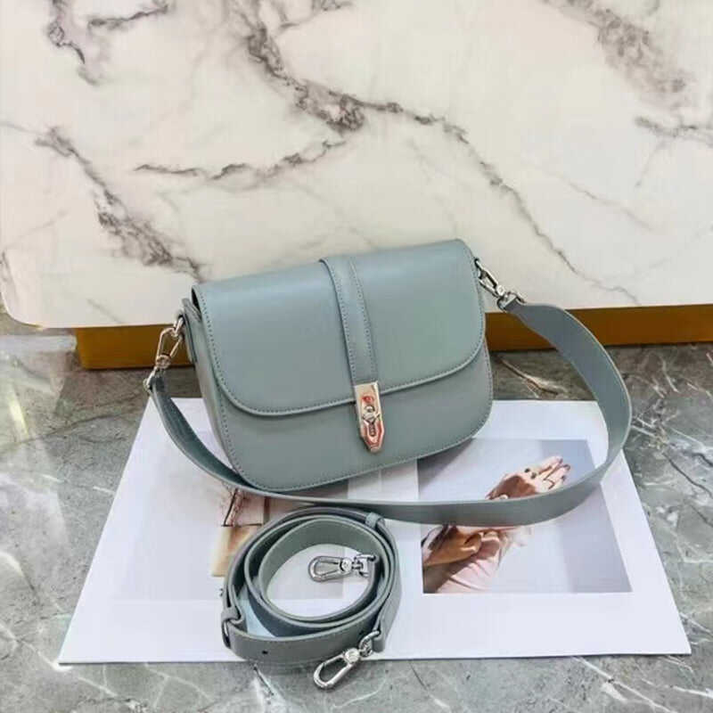 Women's leather flap bag cowhide saddle bag shoulder bag
